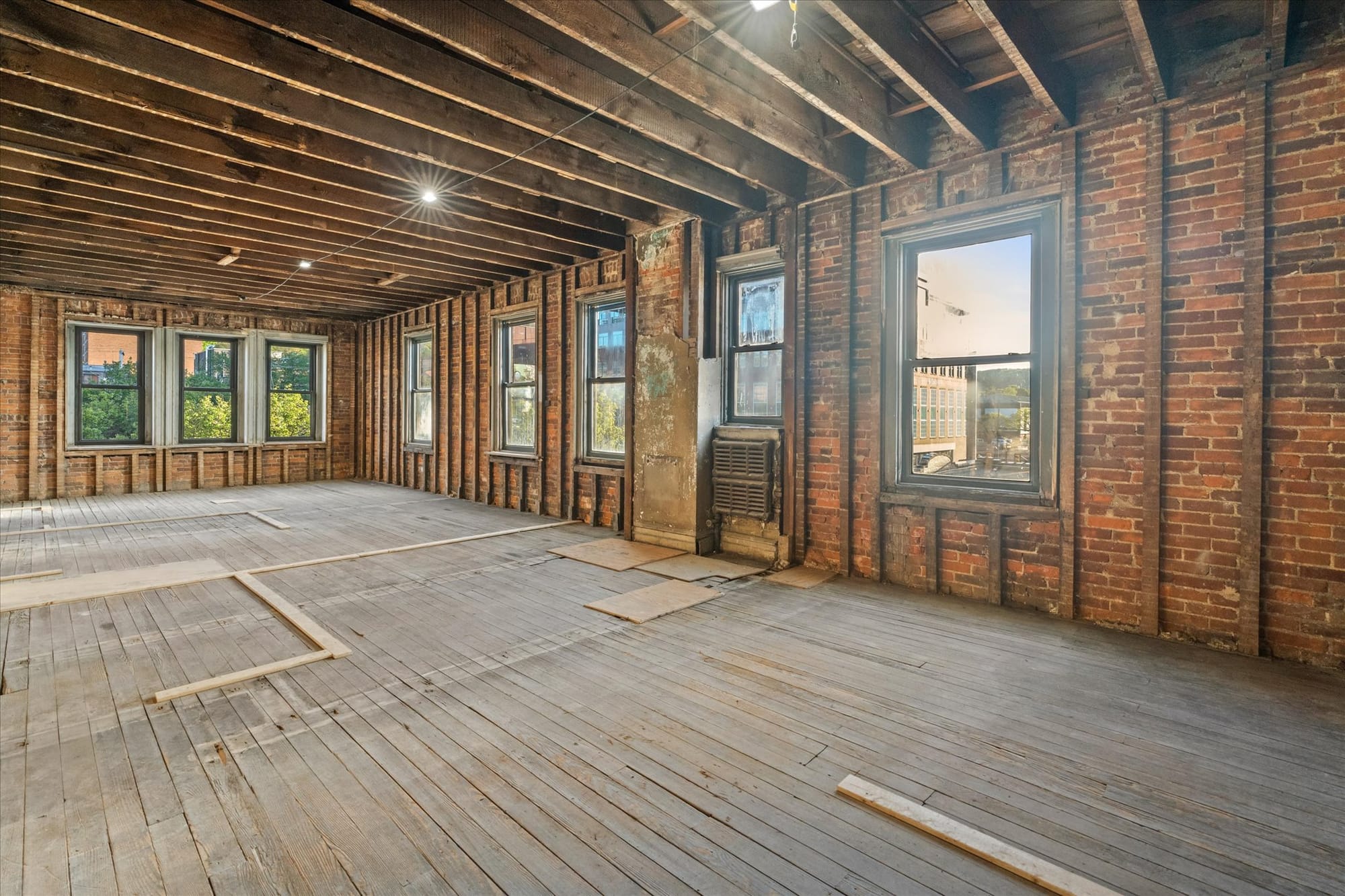 Before and after photos of 'The Emerald on Third,' a mixed-use property now available for sale/lease in the South Side Histor