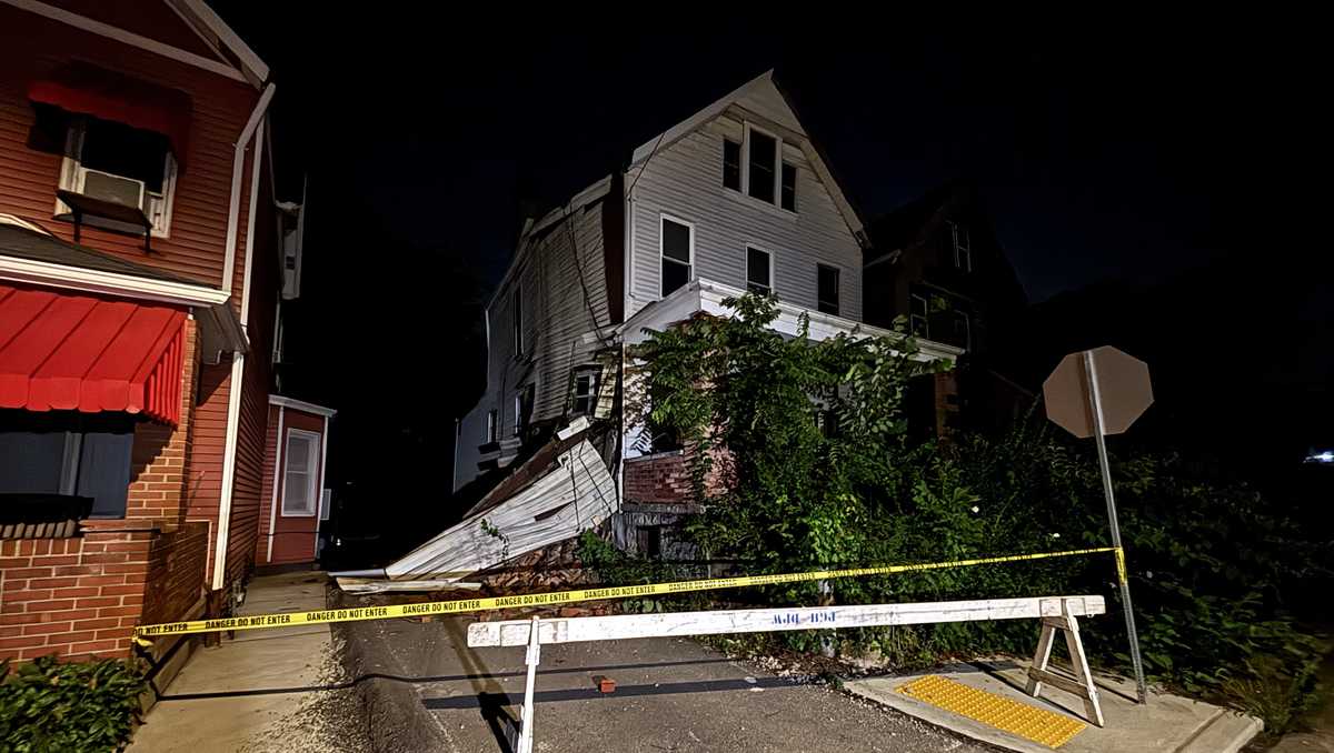 Police tape surrounds home in Pittsburgh's Homewood West after partial collapse