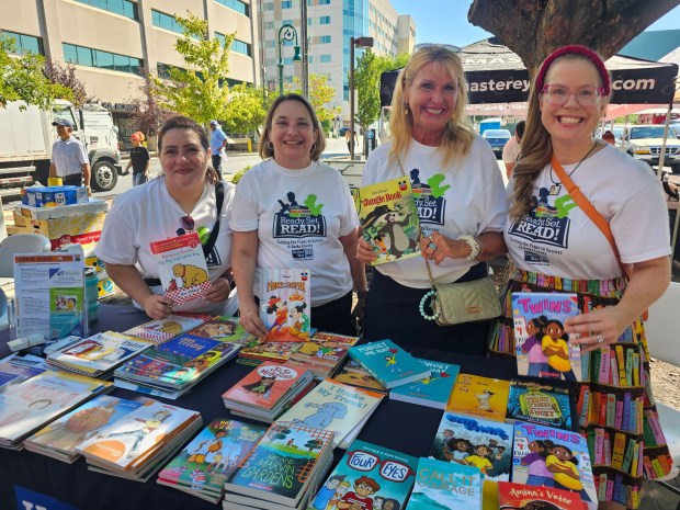 Community partners at a Back-to-School Giveaway, hosted by Mayor Eddie Moran and state Rep. Manny Guzman, included Esmeralda Guzman, Adele Reilly, Deborah Lloyd and Samantha Bremekamp of United Way of Berks County's Ready.Set.READ! program. (MICHELLE LYNCH-READING EAGLE)