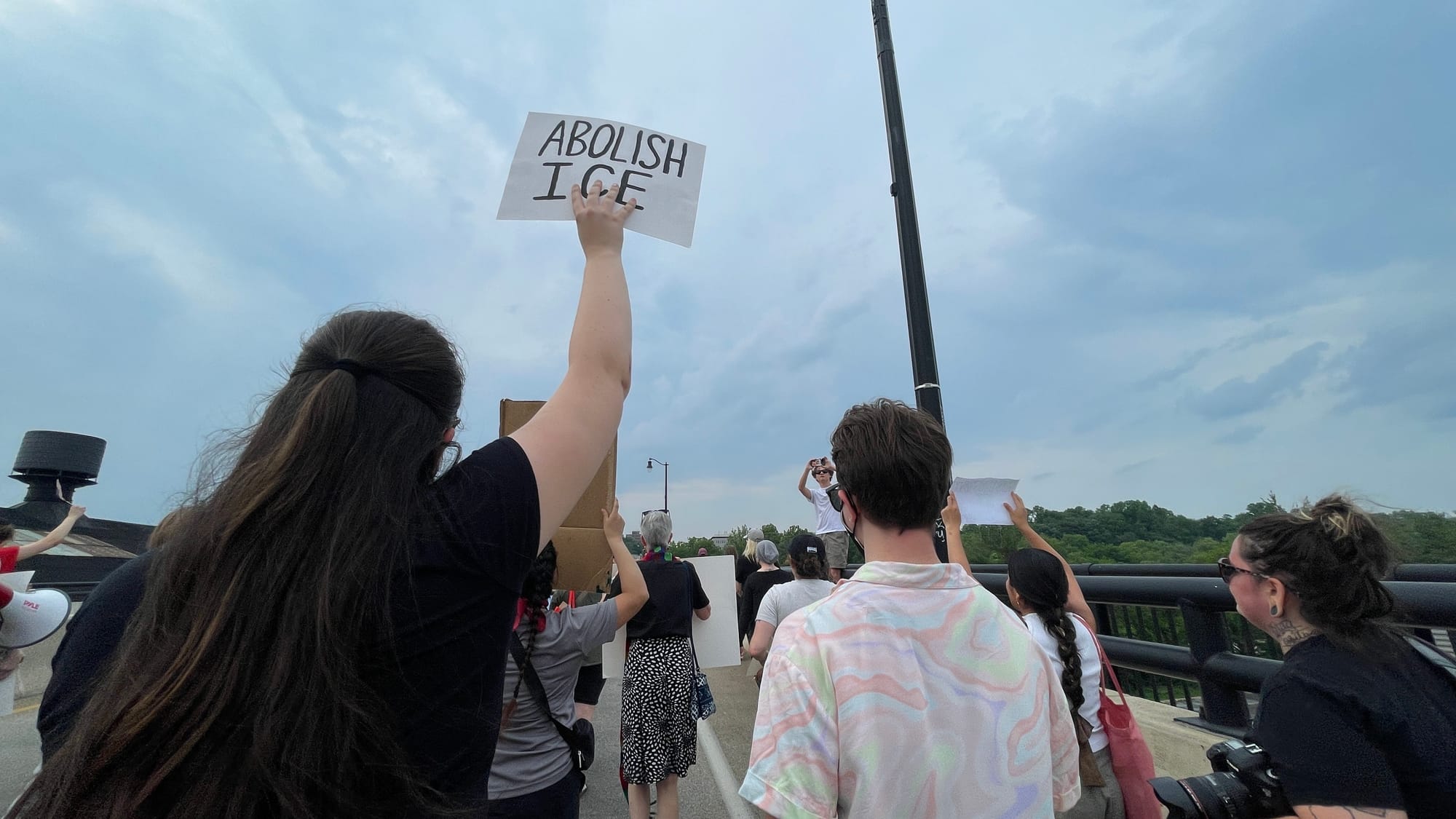 Residents gathered at a rally in Bethlehem on Thursday, June 12 to protest a federal immigration raid at the fire-damaged Fiv