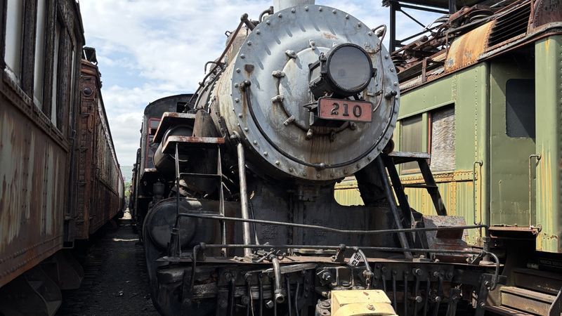 Norwood & St. Lawrence Railroad Locomotive No. 210 sits in the railyard at Steamtown National Historic Site in this 2025 photo. NPS Photo by A. Sweetwood.