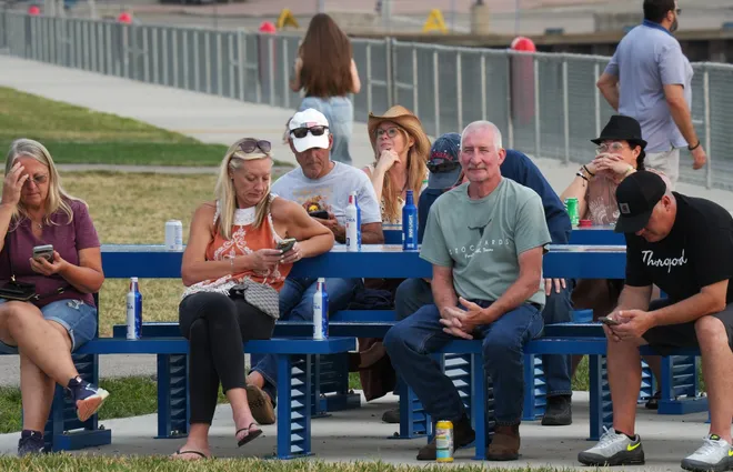 Music fans wait at Liberty Park before Old Crow Medicine Show performs at the Rebich Investments Amphitheater in Erie, Pa., on Aug. 5, 2026.