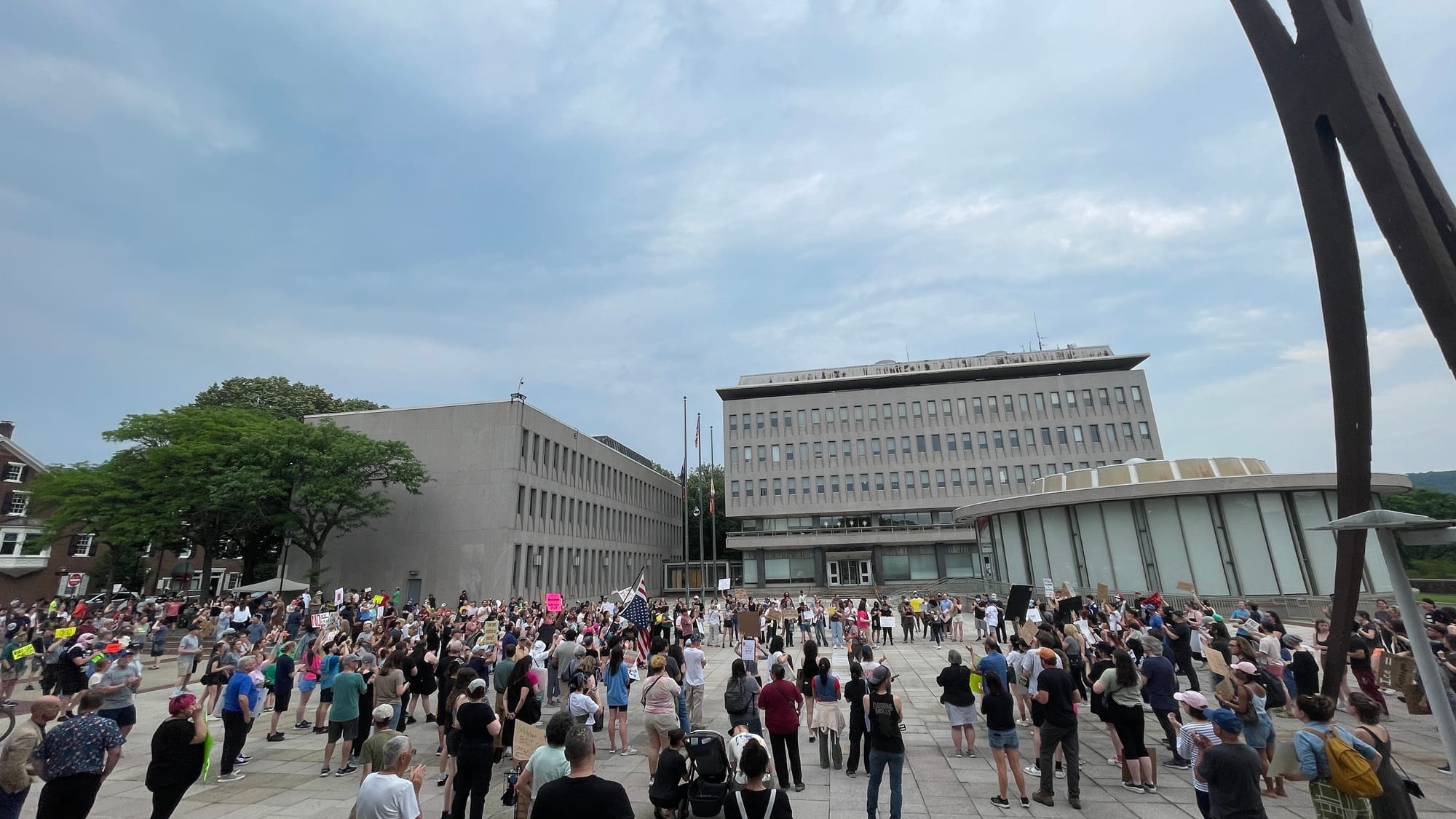 Residents gathered at a rally in Bethlehem on Thursday, June 12 to protest a federal immigration raid at the fire-damaged Fiv