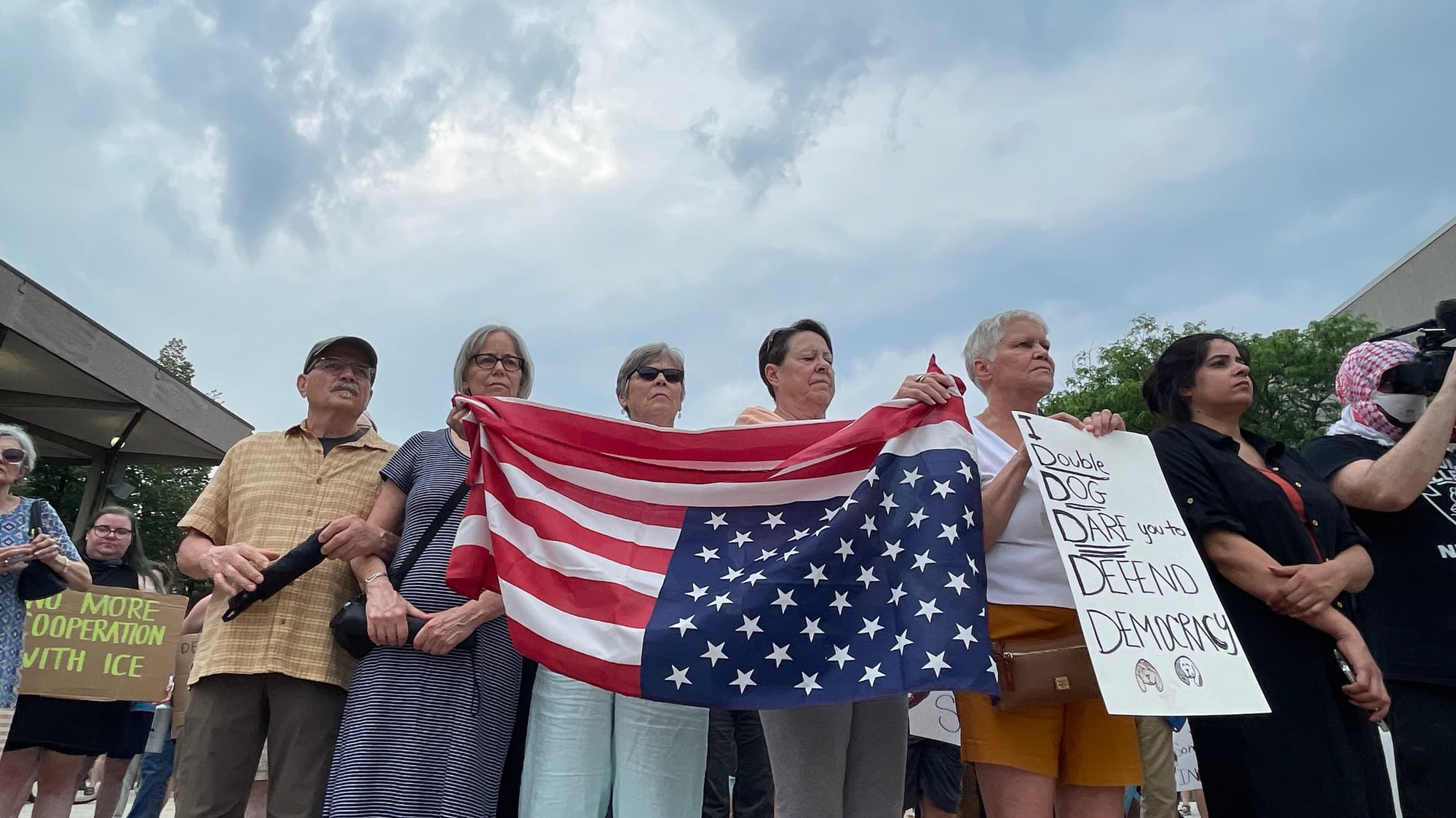 Residents gathered at a rally in Bethlehem on Thursday, June 12 to protest a federal immigration raid at the fire-damaged Fiv