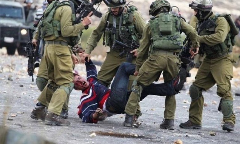 Israeli enemy assault Palestinian in Bethlehem