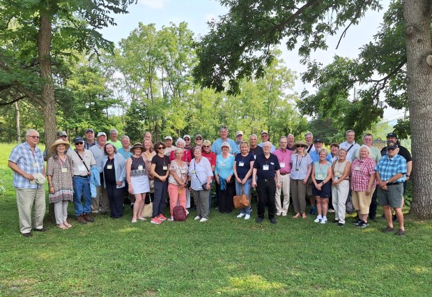 Members of the Boone Society attending the biennial reunion in the Reading area gather for a photo at the Daniel Boone Homestead in Exeter Township. (Courtesy of Robert Crum, society historian.)