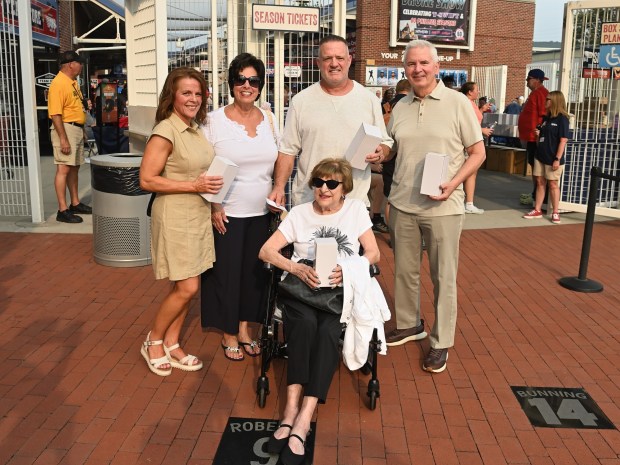 Rocky Colavito's daughter-in-law Kelly Colavito, his daughter Marisa McGrath, widow Carmen Colavito, son Steve Colavito and son-in-law Joe McGrath gather at FirstEnergy Stadium Aug. 11 for Rocky Colavito Tribute Night. (Courtesy of Steve Colavito.)