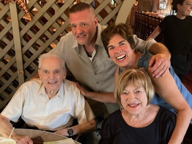 Rocky Colavito, Steve Colavito, Marisa McGrath and Carmen Colavito gather for a family dinner. (Courtesy of Steve Colavito.)