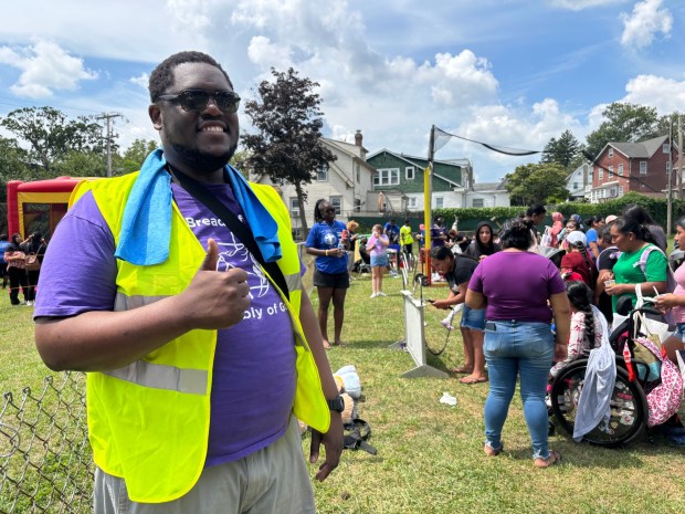 Alusine "Brother Al" Kandeh said the Bread of Life Assembly of God's fifth annual Free School Backpack Giveaway/Community Fun Day looked like what he expects heaven to look like. (KATHLEEN E. CAREY - DAILY TIMES)