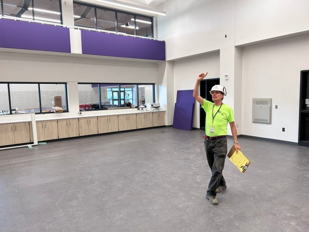 Upper Darby School District Director of Capital Projects Craig Harnitchek talks about the acoustics in one of the music rooms on Friday at Clifton Heights Middle School ahead of the first day of classes on Monday. (PETE BANNAN-DAILY TIMES)