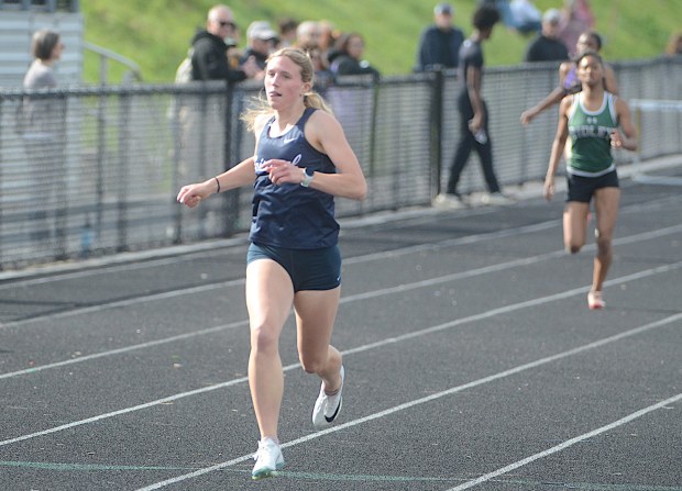 Episcopal Academy's Ava Cavanaugh takes first in the 400 at the Delco Girls Track and Field Championships at Upper Darby. (PETE BANNAN-DAILY TIMES)
