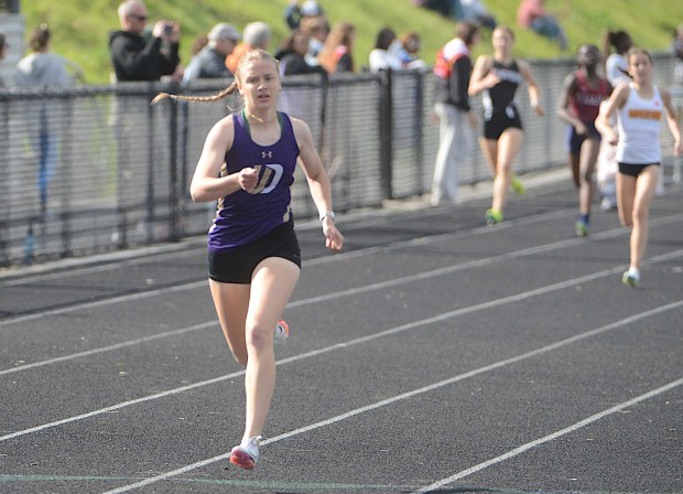 Upper Darby's Kadi Golembiewski runs in the 400 meters at the Delco Track and Field Championships in April. (PETE BANNAN/MediaNews Group)