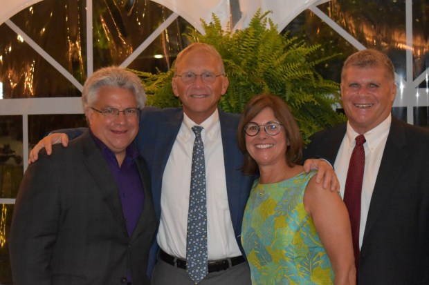 VOiCEup Berks presented its inaugural Unsung Hero Awards recently at a 10th anniversary gala. David Patti of Customers Bank, Christopher Pruitt of East Penn Manufacturing, and Carl and Charlene Dragonette were honored for years of mentorship and support of young people.(Courtesy of VOiCEup Berks.)