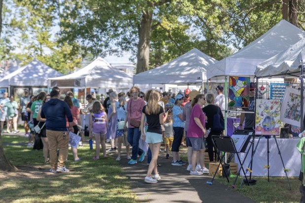 Visitors stroll through the Lansdale Festival of the Arts at Memorial Park in 2025. (Photo by James Short for North Penn Now)