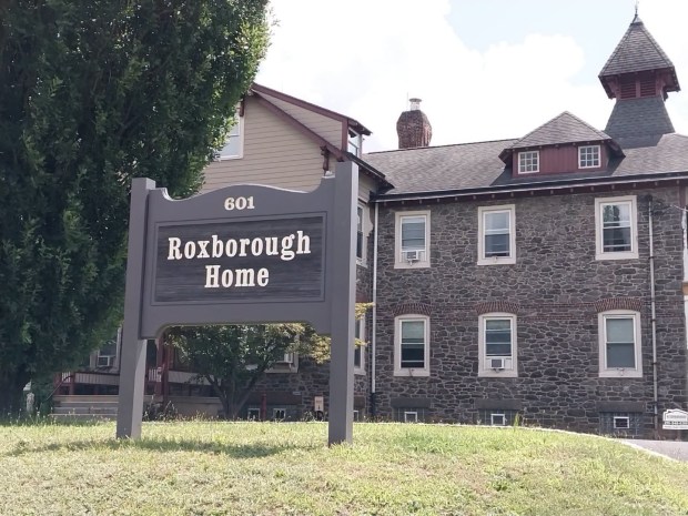 Hats off to Myles Pettengill for giving the entrance sign a much-needed makeover. (Photo courtesy of Roxborough Home for Women)