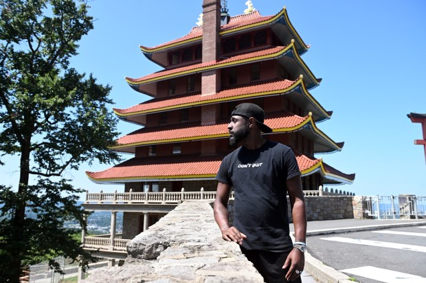 Reading artist Theron Cook has a new-found appreciation of the Pagoda and its meaning to the community. (BILL UHRICH/READING EAGLE)