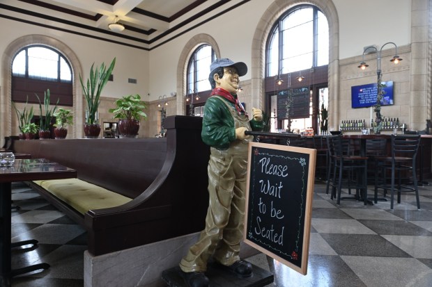 Frankie, the mascot at the Saucony Creek Franklin Station Brewpub, greets patrons to the restored former Reading Railroad passenger station. (BILL UHRICH/READING EAGLE)