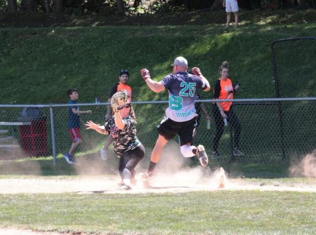 Players participate in the 2025 Strong and Coura'Jess Foundation's coed softball tournament. The annual event is the nonprofit's largest fundraiser. (Courtesy of Sam Donahue)