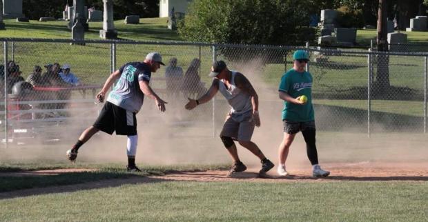 Players participate in last year's Strong and Coura'Jess Foundation's coed softball tournament. The fifth annual tournament on Aug. 22 honors Jessica Rutkowski and her mission to help other cancer patients. (Courtesy of Sam Donahue)