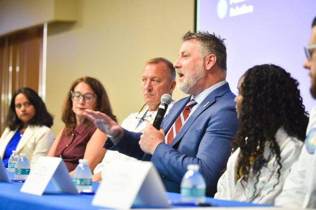 Philadelphia College of Osteopathic Medicine Dean and Chief Academic Officer Peter Bidey, DO, speaks on a panel with medical students and healthcare professionals touting the Northeast Pennsylvania Clinical Education Consortium during an event at Regional Hospital of Scranton in Scranton Wednesday, August 12, 2026. (SEAN MCKEAG / STAFF PHOTOGRAPHER)
