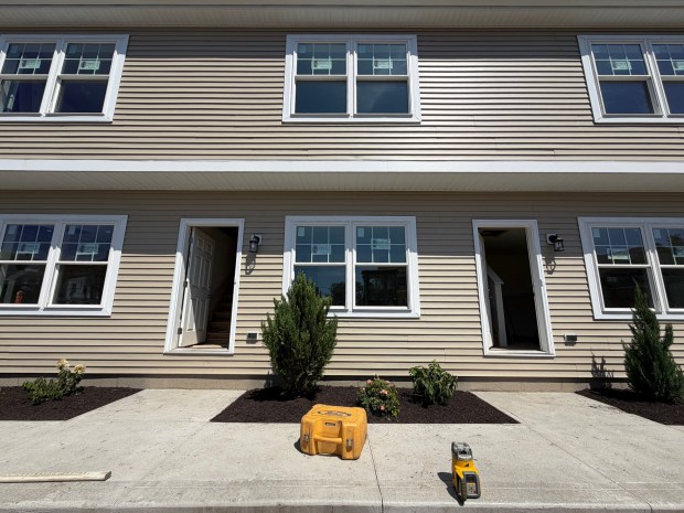 The front entrances to new townhouses being constructed on Wheeler Avenue in Scranton Wednesday, August 26, 2026. (SEAN MCKEAG / STAFF PHOTOGRAPHER)