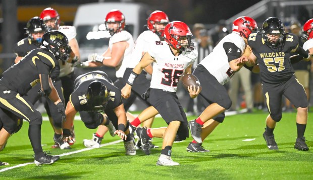 Honesdale's Gabe Duda picks up a big gain in the first quarter against Western Wayne on Friday, Sept. 26, 2025. (JESSE CAREY / CONTRIBUTING PHOTOGRAPHER)