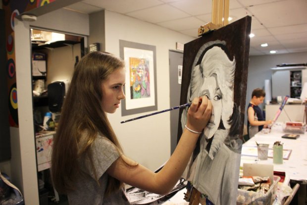 Abington Art Studio student, Kelsie Fritch, 14, of Waverly Township, finishes her portrait of Dolly Parton. (TIMES-TRIBUNE FILE)