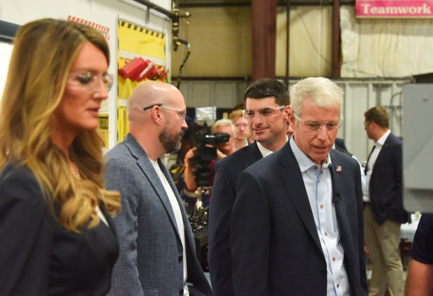 CEO of Creative Design and Machining Inc. (CDMI) Layne Crothers, center left, speaks to U.S. Rep. Rob Bresnahan during a tour with U.S. Small Business Administration Administrator Kelly Loeffler and U.S. Secretary of Energy Chris Wright at CDMI in South Abington Twp. Monday, August 24, 2026. (SEAN MCKEAG / STAFF PHOTOGRAPHER)