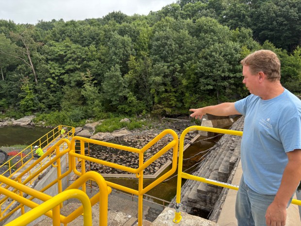 Kurt Staller, Pennsylvania American Water's chief engineer for dams, discusses the company's No. 7 Reservoir Dam in Dunmore on Wednesday, Aug. 12, 2026. (JIM LOCKWOOD / STAFF PHOTO)