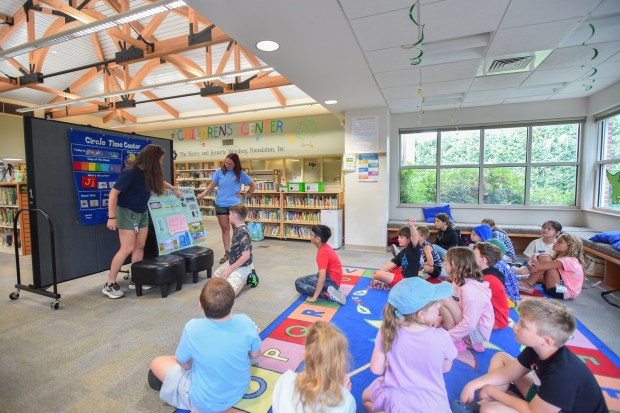 Engineers with Pennsylvnia American Water Melanie Fouts and Sarah Mihalick give a presentation on water tanks to students during the Wonderful World of Water Camp at Valley Community Library in Peckville Monday, August 3, 2026. (SEAN MCKEAG / STAFF PHOTOGRAPHER)