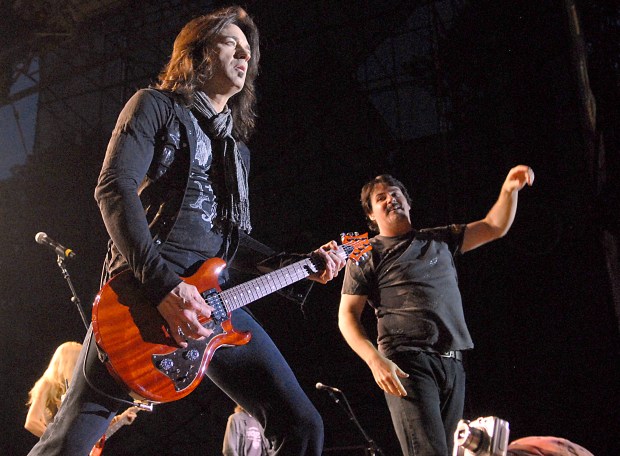 BETHLEHEM - - 5MUSIKFESTboston-- Lead guitarist-vocalist Michael Sweet (left) joins singer Tommy DeCarlo (right) with classic rock band Boston, on stage at Riverplace during Musikfest headliner show on Monday, August 4, 2008. (Harry Fisher/TMC) |// to be published with GEHMAN story in LOCAL. ORG XMIT: NGM_0K53TA9R