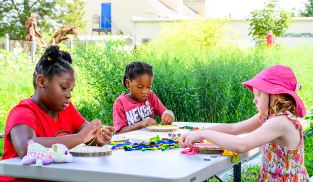 Dakota, Jaxson and Marion all create string art inspired by plants and flowers Monday, Aug. 17, 2026, during Art in the Garden: A Week of Creativity in Easton Urban Farm at the Neighborhood Center in Easton. During the event, children spend their mornings exploring the Easton Urban Farm while creating hands-on art inspired by the world around them. (April Gamiz/The Morning Call)