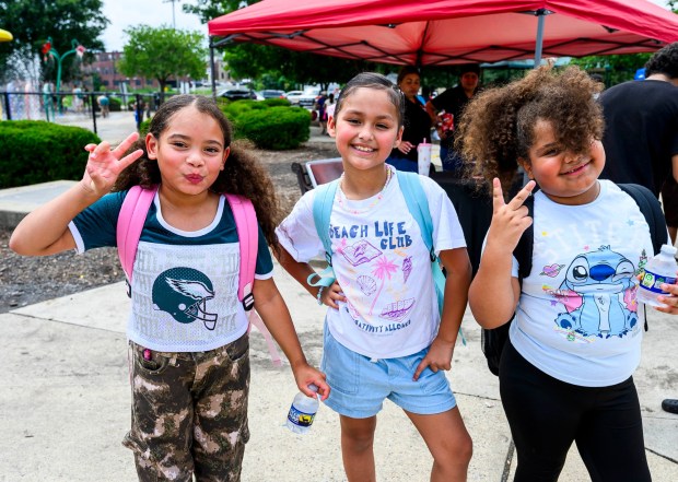 Children enjoy the activities Saturday, Aug. 8, 2026, during the 9th Annual Back To School Event hosted by Puertorrican Culture Preservation Inc at Buck Boyle Park in Allentown. The event featured 500 free backpacks, snacks and back-to-school supplies given by local organizations. (April Gamiz/The Morning Call)