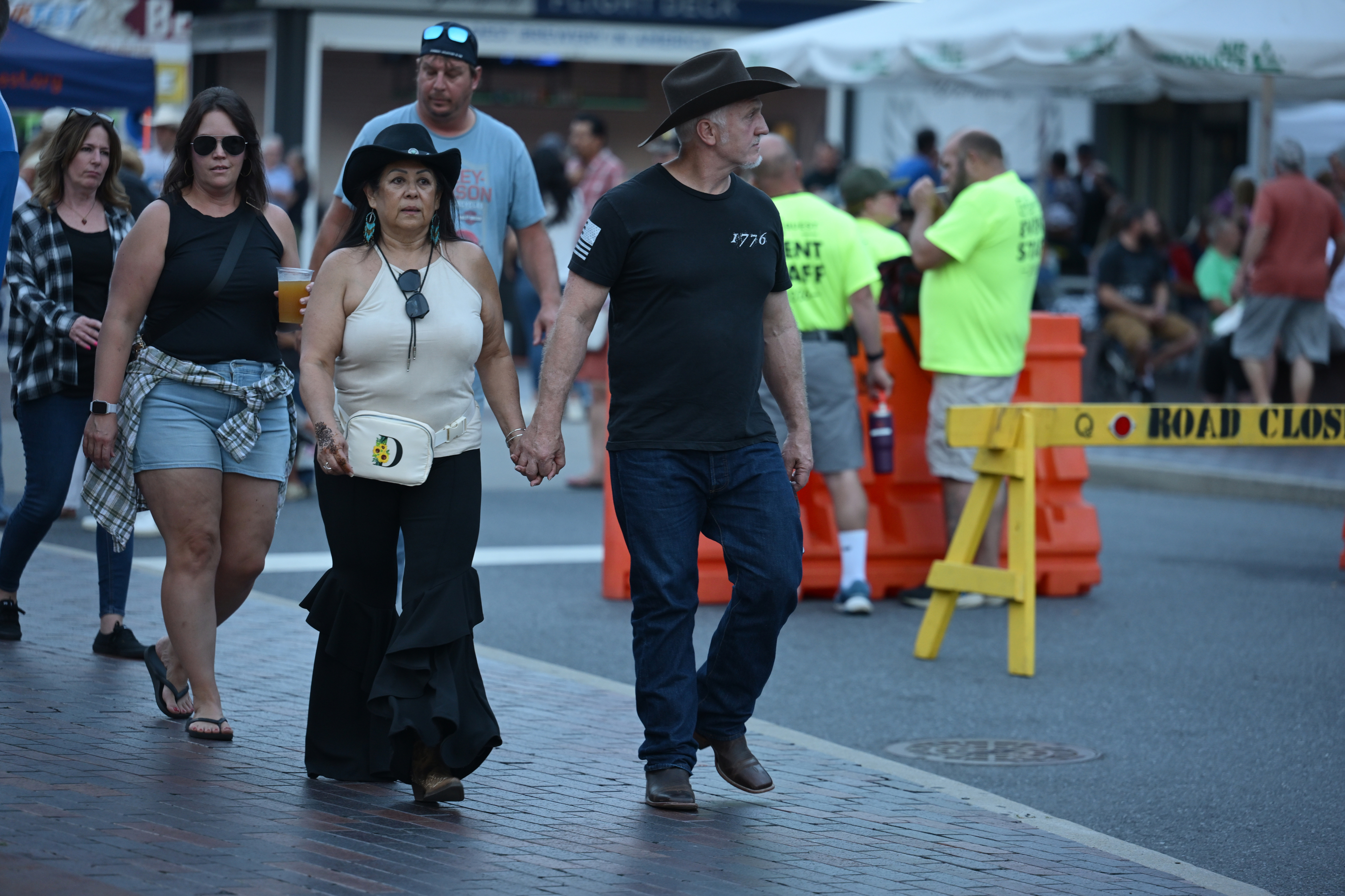 People enjoy the sights and sounds Saturday, Aug. 22, 2026, of CountryFest, a celebration of country music at SteelStacks in Bethlehem. The new festival was held Friday and Saturday. The festival featured nationally touring country artists, rising stars and local performers, including Clayton Mullen, Luke Borchelt and Peytan Porter and tribute bands performing the music of stars Kenny Chesney and Lainey Wilson. (Monica Cabrera/The Morning Call)