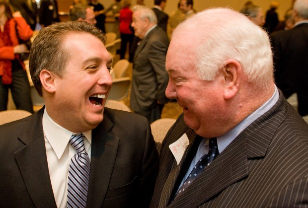 Lehigh County Executive Don Cunningham, left, shares a laugh with Lehigh County DA Jim Martin at DeSales University after his "State of Lehigh County" address on Monday Feb. 11, 2008. He announced a new program designed to put more police into Lehigh Counties highest crime rate communities.(Douglas Kilpatrick/Special to The Morning Call)
