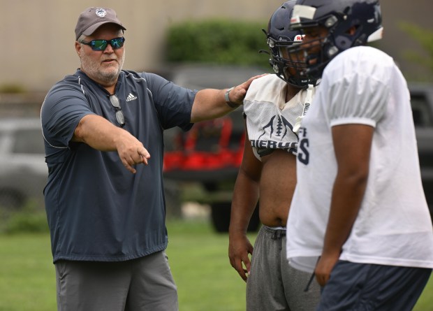 The Dieruff football team led by Coach Dave Lutte holds practice Monday, Aug, 10, 2026, on the opening day of the heat acclimatization period. The Huskies practice well away from the school on North 3rd Street in Allentown. (Monica Cabrera/The Morning Call)