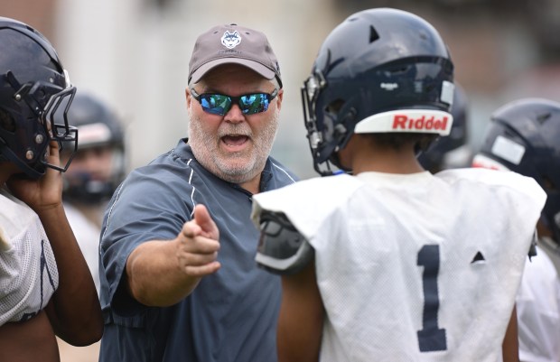The Dieruff football team led by Coach Dave Lutte holds practice Monday, Aug, 10, 2026, on the opening day of the heat acclimatization period. The Huskies practice well away from the school on North 3rd Street in Allentown. (Monica Cabrera/The Morning Call)