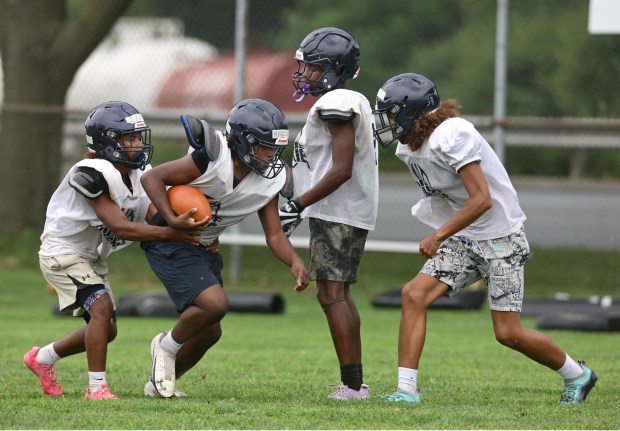 The Dieruff High School football team kicks off its preseason training Monday, Aug, 10, 2026, on the opening day of the heat acclimatization period. The Huskies practice well away from the school on North 3rd Street in Allentown. (Monica Cabrera/The Morning Call)