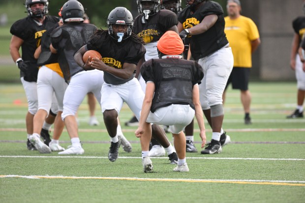 Freedom High School Football players run drills Monday, Aug. 17, 2026, during their football practice in Bethlehem. Freedom is coming off a tough season by their standards. The Patriots were 5-6 last season, but are optimistic about staging a turnaround. (Monica Cabrera/The Morning Call)