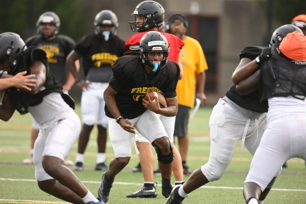 Freedom High School Football players run drills Monday, Aug. 17, 2026, during their football practice in Bethlehem. Freedom is coming off a tough season by their standards. The Patriots were 5-6 last season, but are optimistic about staging a turnaround. (Monica Cabrera/The Morning Call)