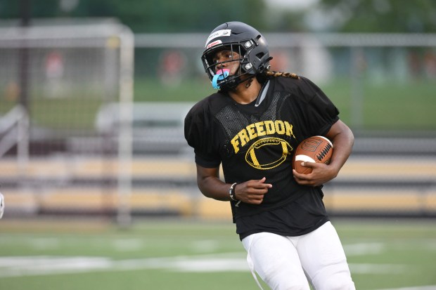 Freedom High School Football players run drills Monday, Aug. 17, 2026, during their football practice in Bethlehem. Freedom is coming off a tough season by their standards. The Patriots were 5-6 last season, but are optimistic about staging a turnaround. (Monica Cabrera/The Morning Call)