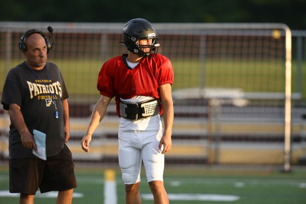 Freedom High School Football players run drills Monday, Aug. 17, 2026, during their football practice in Bethlehem. Freedom is coming off a tough season by their standards. The Patriots were 5-6 last season, but are optimistic about staging a turnaround. (Monica Cabrera/The Morning Call)