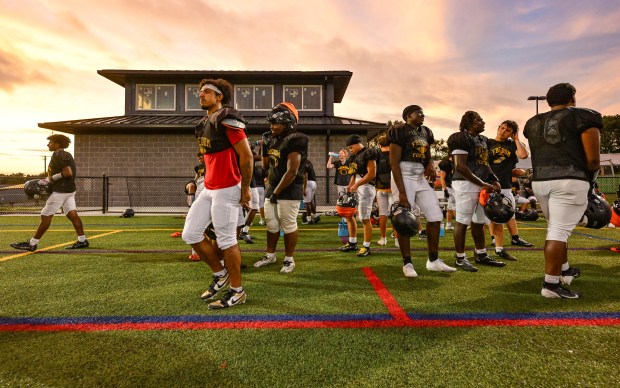 Freedom High School Football players run drills in the evening of Monday, Aug. 17, 2026, during their football practice in Bethlehem. Freedom is coming off a tough season by their standards. The Patriots were 5-6 last season, but are optimistic about staging a turnaround. (Monica Cabrera/The Morning Call)