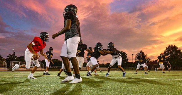 Freedom High School Football players run drills in the evening of Monday, Aug. 17, 2026, during their football practice in Bethlehem. Freedom is coming off a tough season by their standards. The Patriots were 5-6 last season, but are optimistic about staging a turnaround. (Monica Cabrera/The Morning Call)