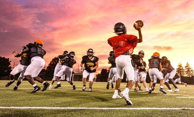 Freedom High School Football players run drills in the evening of Monday, Aug. 17, 2026, during their football practice in Bethlehem. Freedom is coming off a tough season by their standards. The Patriots were 5-6 last season, but are optimistic about staging a turnaround. (Monica Cabrera/The Morning Call)
