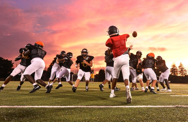 Freedom High School Football players run drills in the evening of Monday, Aug. 17, 2026, during their football practice in Bethlehem. Freedom is coming off a tough season by their standards. The Patriots were 5-6 last season, but are optimistic about staging a turnaround. (Monica Cabrera/The Morning Call)