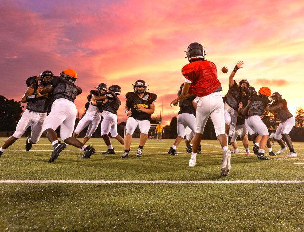 Freedom High School Football players run drills in the evening of Monday, Aug. 17, 2026, during their football practice in Bethlehem. Freedom is coming off a tough season by their standards. The Patriots were 5-6 last season, but are optimistic about staging a turnaround. (Monica Cabrera/The Morning Call)