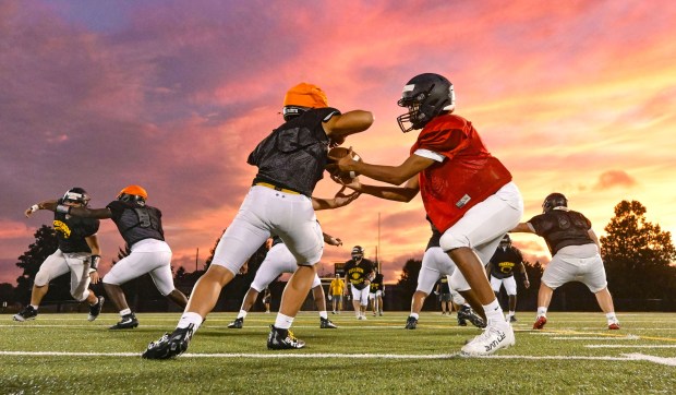 Freedom High School Football players run drills in the evening of Monday, Aug. 17, 2026, during their football practice in Bethlehem. Freedom is coming off a tough season by their standards. The Patriots were 5-6 last season, but are optimistic about staging a turnaround. (Monica Cabrera/The Morning Call)