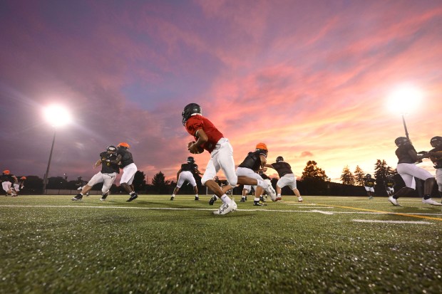 Freedom High School Football players run drills in the evening of Monday, Aug. 17, 2026, during their football practice in Bethlehem. Freedom is coming off a tough season by their standards. The Patriots were 5-6 last season, but are optimistic about staging a turnaround. (Monica Cabrera/The Morning Call)