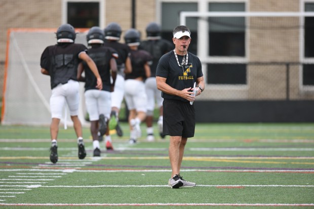 Freedom head coach Jason Roeder works with his team Monday, Aug. 17, 2026, during their football practice in Bethlehem. Freedom is coming off a tough season by their standards. The Patriots were 5-6 last season, but are optimistic about staging a turnaround. (Monica Cabrera/The Morning Call)